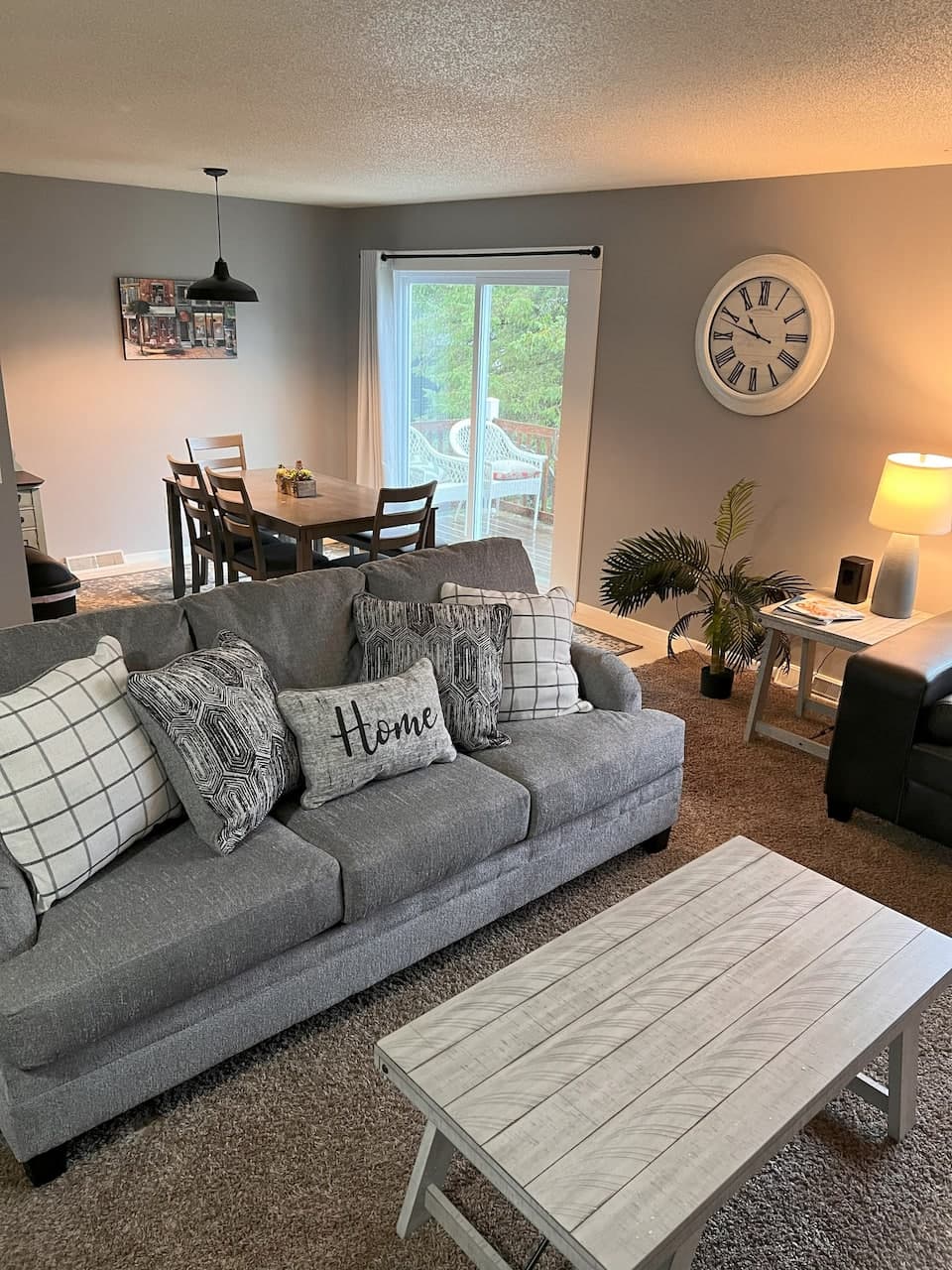 Living and dining room of the Sparta upper apartment, looking toward the patio